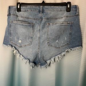 Celebrity Pink jean shorts. button fly. some distressing. size 17/33